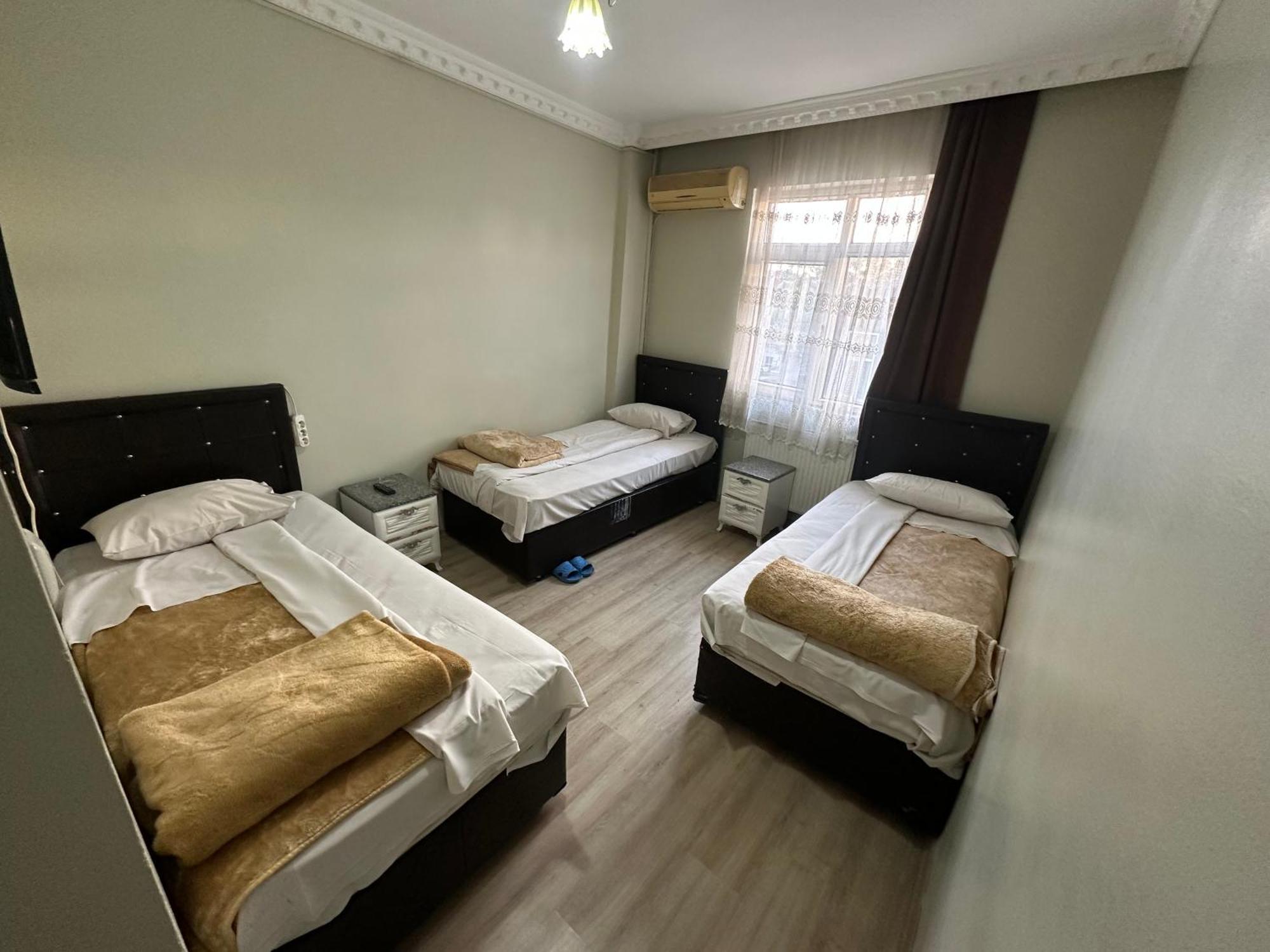 Üç Kişilik Oda
