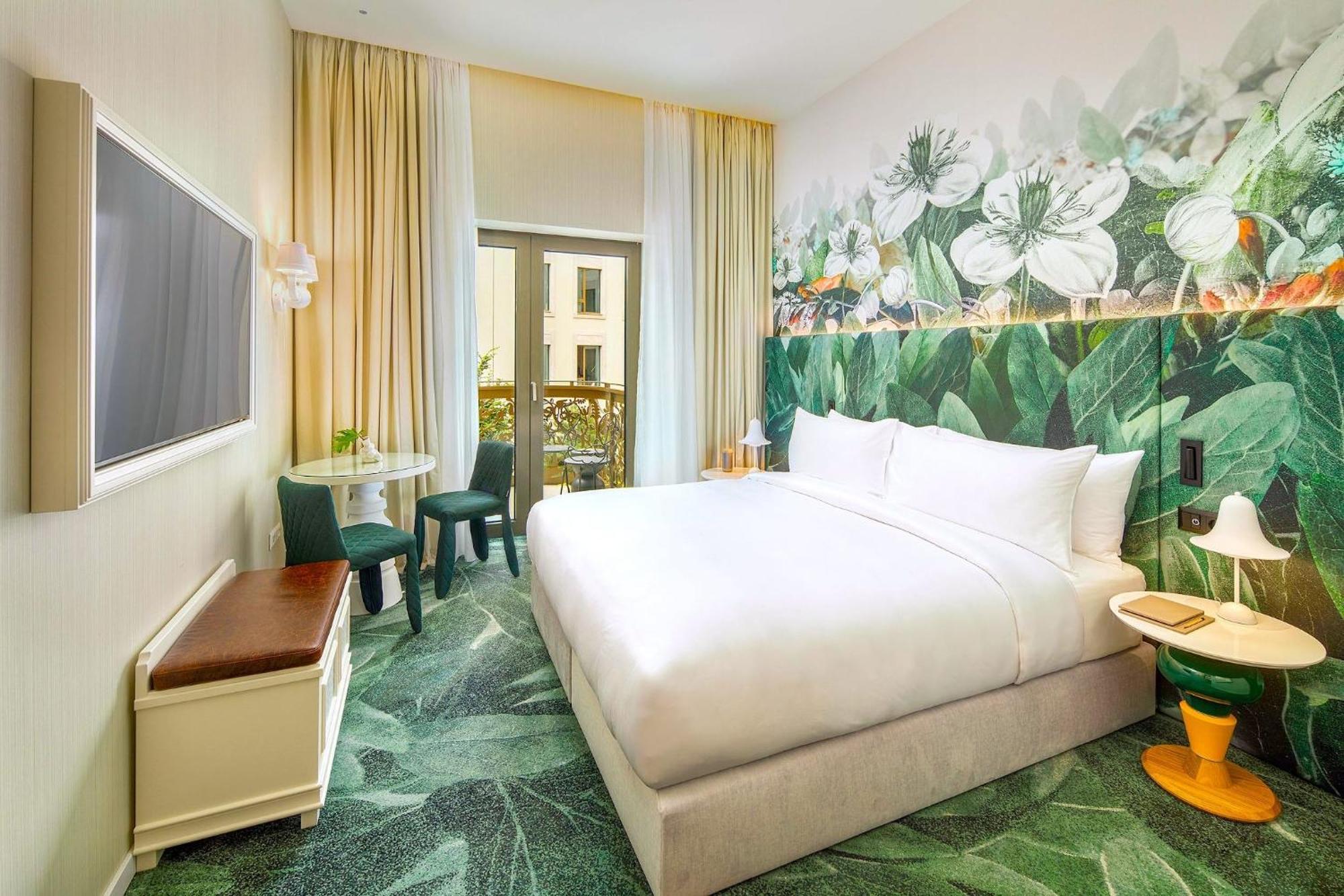 Essential King Room with Garden View and Furnished Balcony,1686685178:JPEG