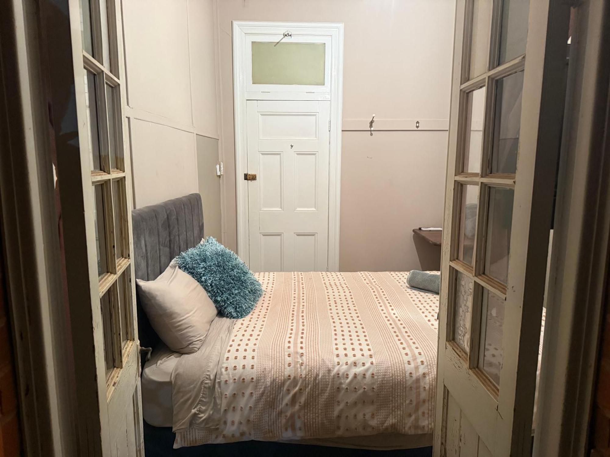 Queen Room with Shared Bathroom