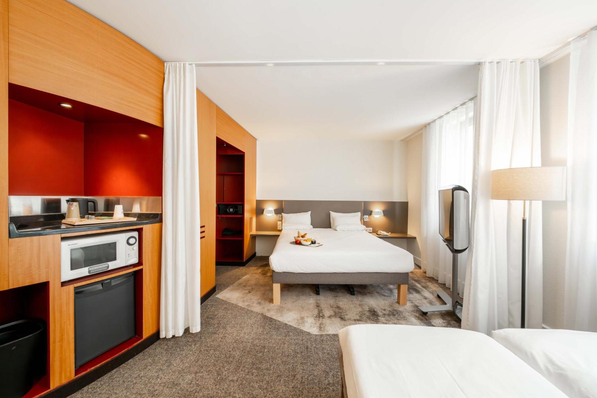 Superior Suite met Queensize Bed en 2 Eenpersoonsbedden 