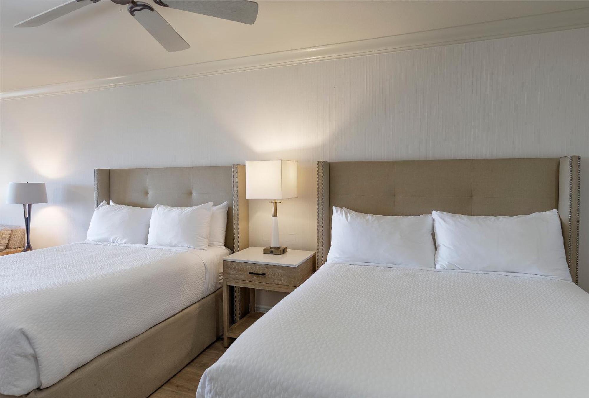 Queen Suite with Two Queen Beds and Partial Ocean View