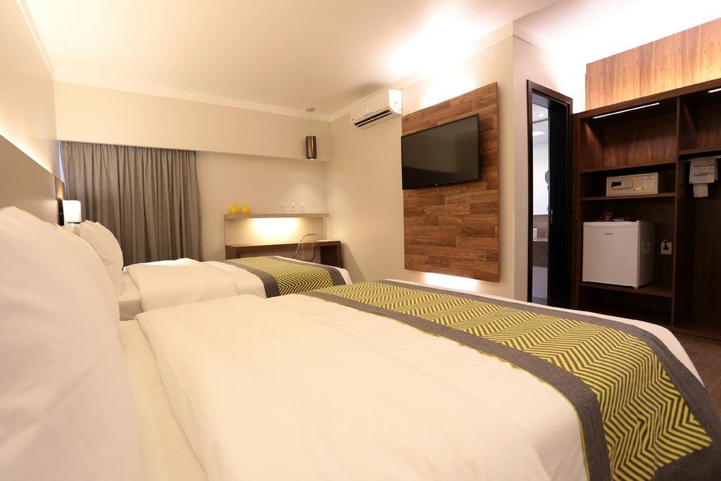 Quarto deluxe com 2 camas de casal
