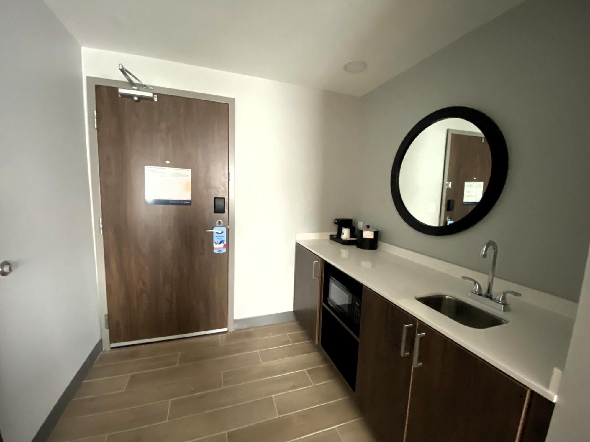 Two Room Suite with One King and Two Queen Beds