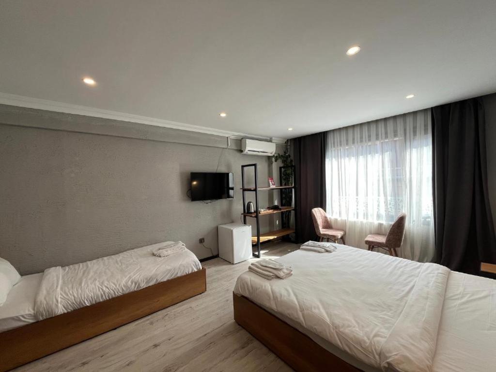ห้องดีลักซ์สำหรับสามท่าน