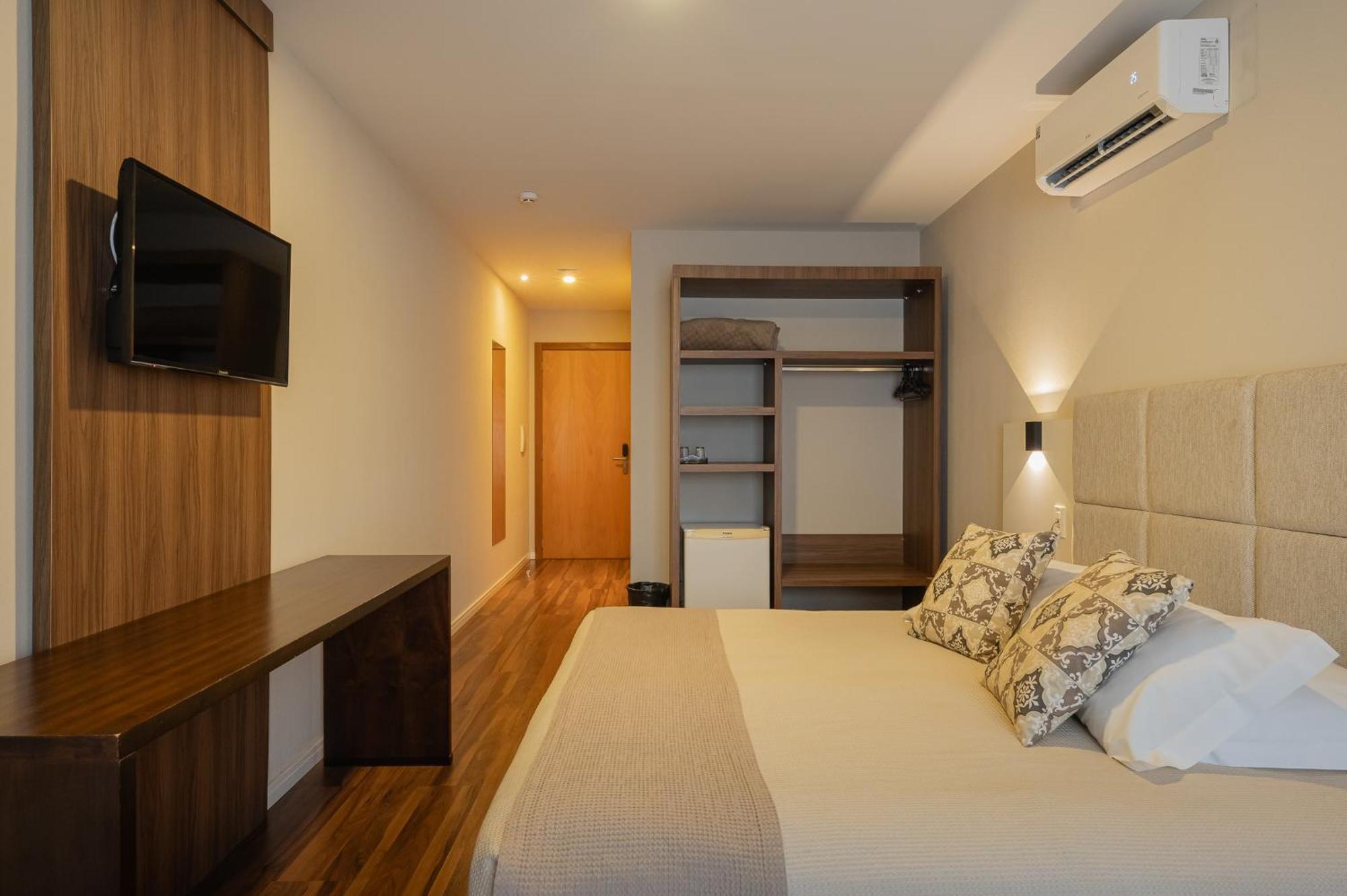 Quarto Deluxe com Cama de Casal ou 2 de Solteiro