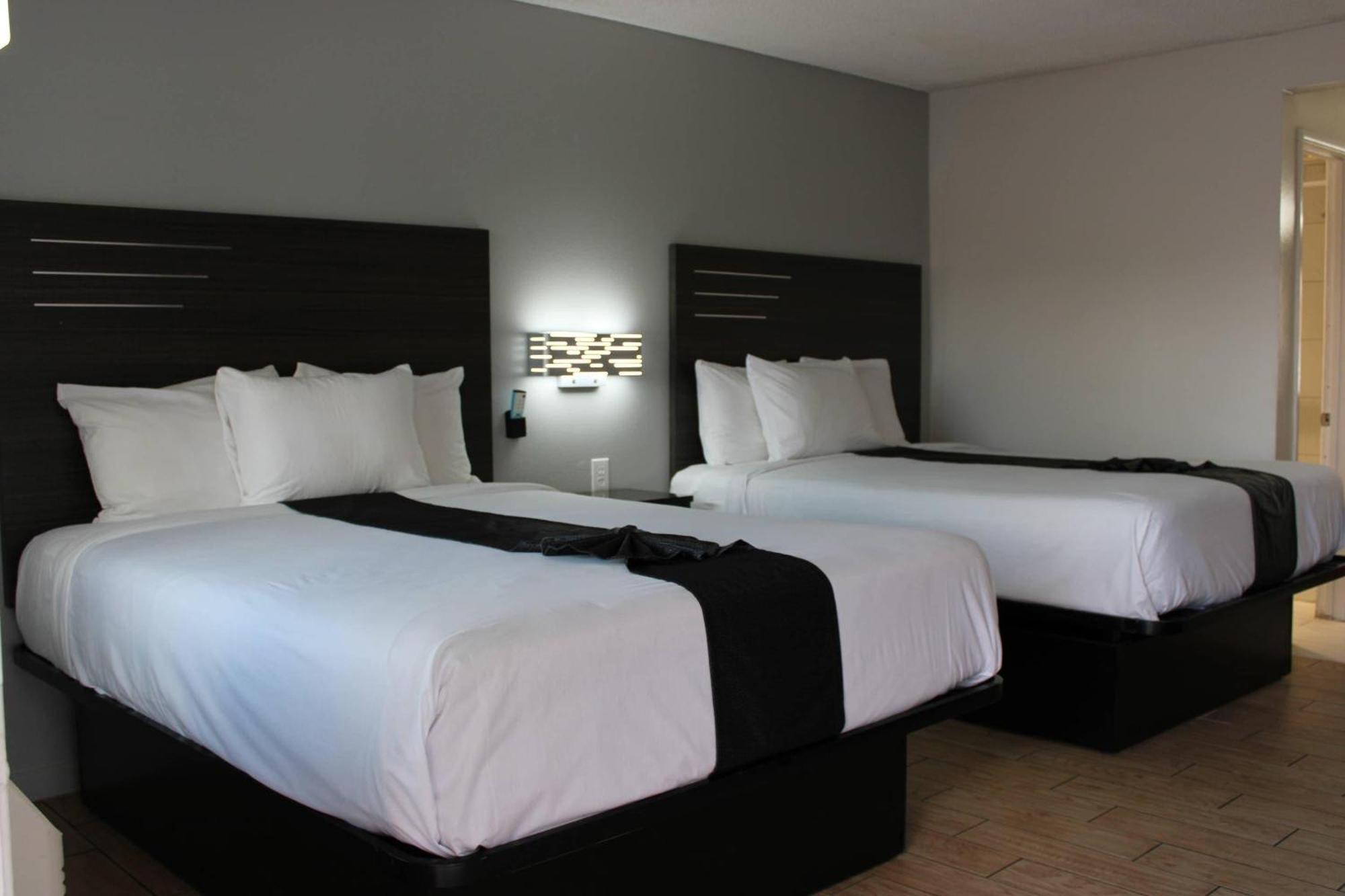 Quadruple Room Two Queen Beds Non Smoking or Exterior Corridor