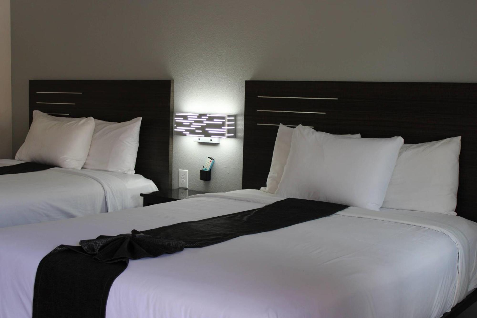 Quadruple Room Two Queen Beds Non Smoking or Exterior Corridor