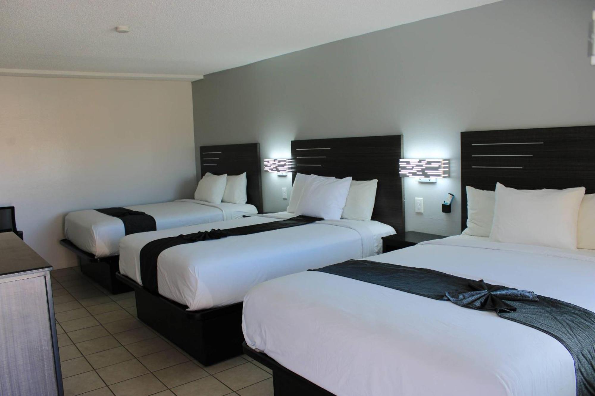 Family Room Three Queen Beds Non Smoking or Exterior Corridor