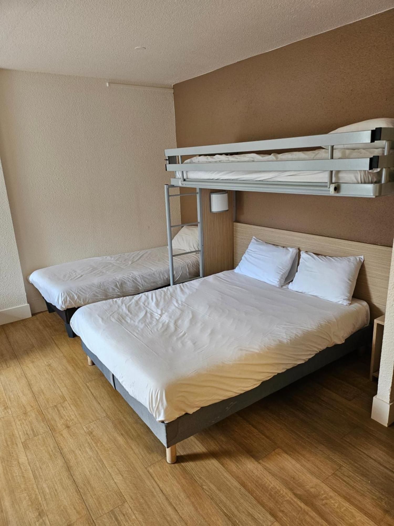 Quadruple Room 1 Double Bed 2 Single Beds