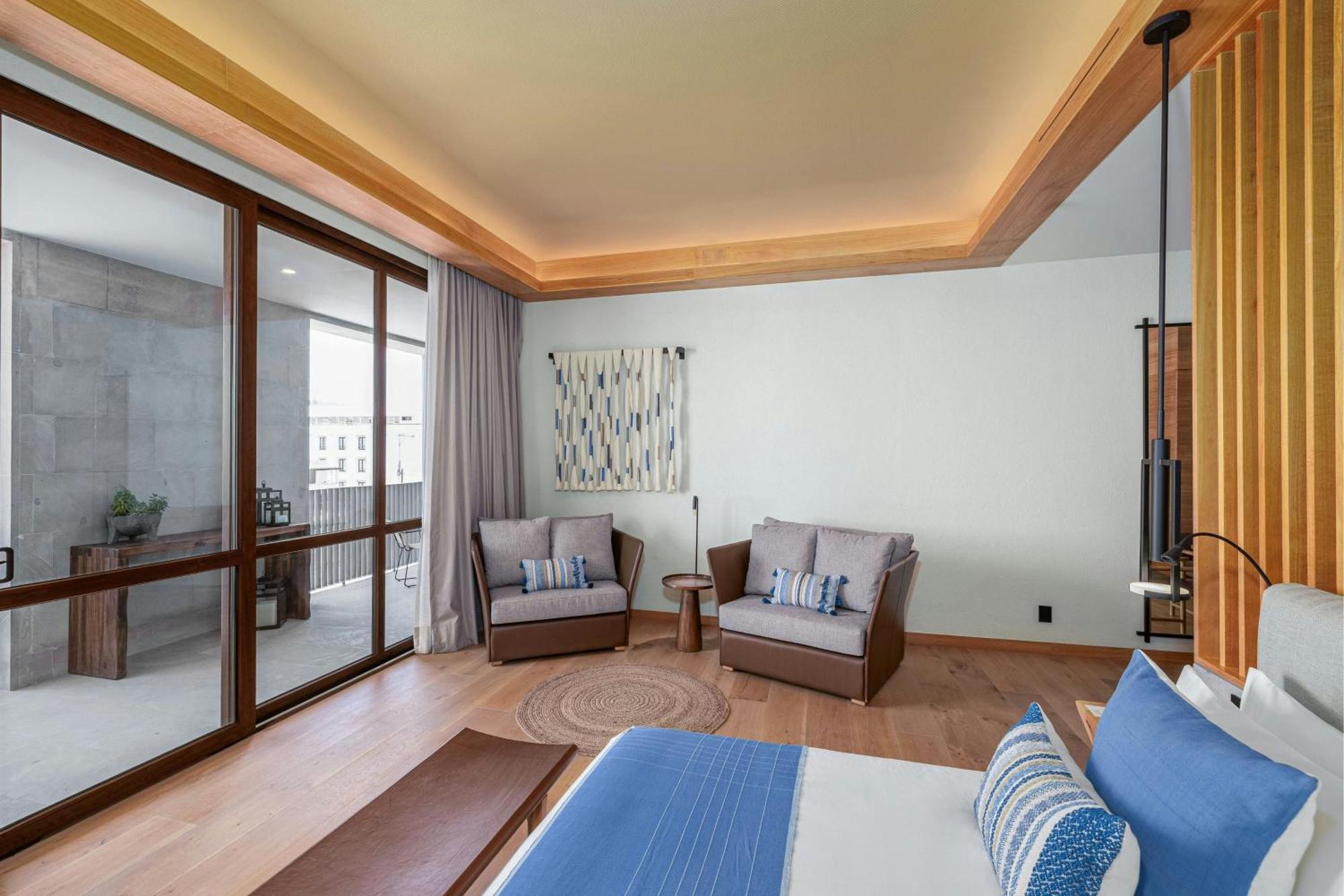 Master One-Bedroom King Suite with Sofa Bed and City View