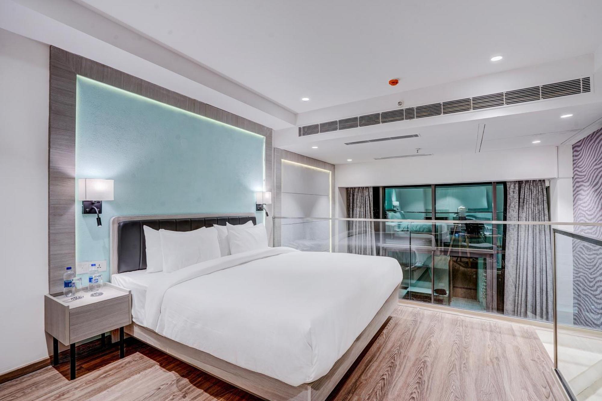 Duplex Executive Suite Twin Bed with Balcony (Welcome Drink,Early checkin/Late Checkout (Subject to availability),20% Off on F&B, 15 % Discount on Laundry and 20% off on 1 session of 60 mins Spa)