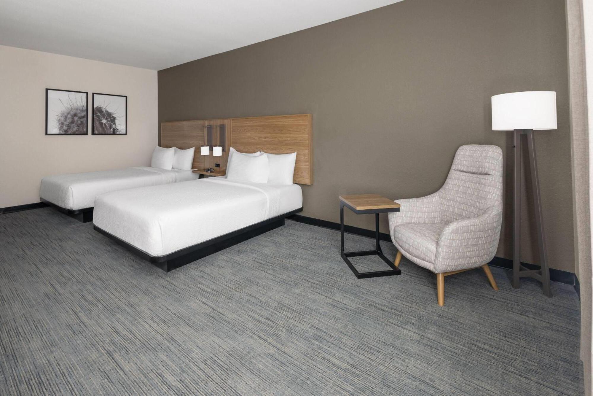 Queen Room Two Queen Beds Roll Shower Vision Access or Non-Smoking