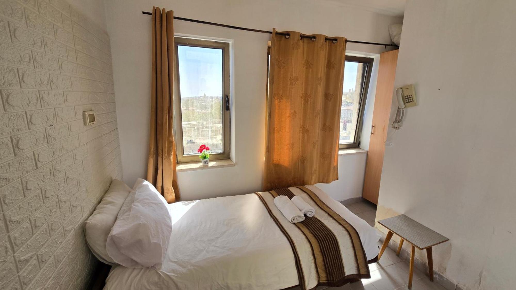 Single Room Rooftop 1 Single Bed,1710608221:JPEG