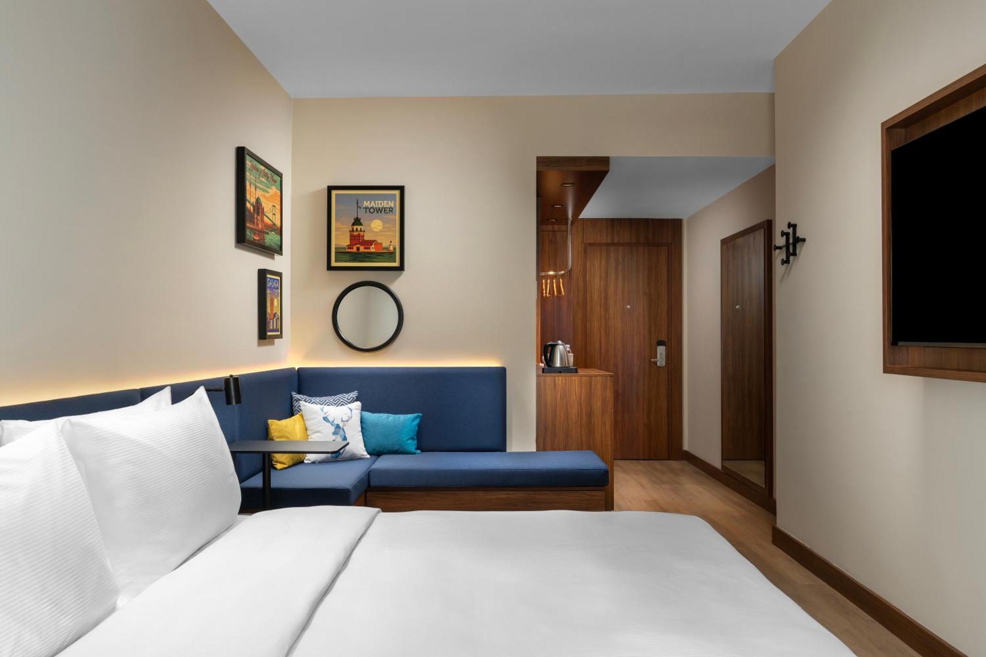 Kamer met Queensize Bed en Slaapbank