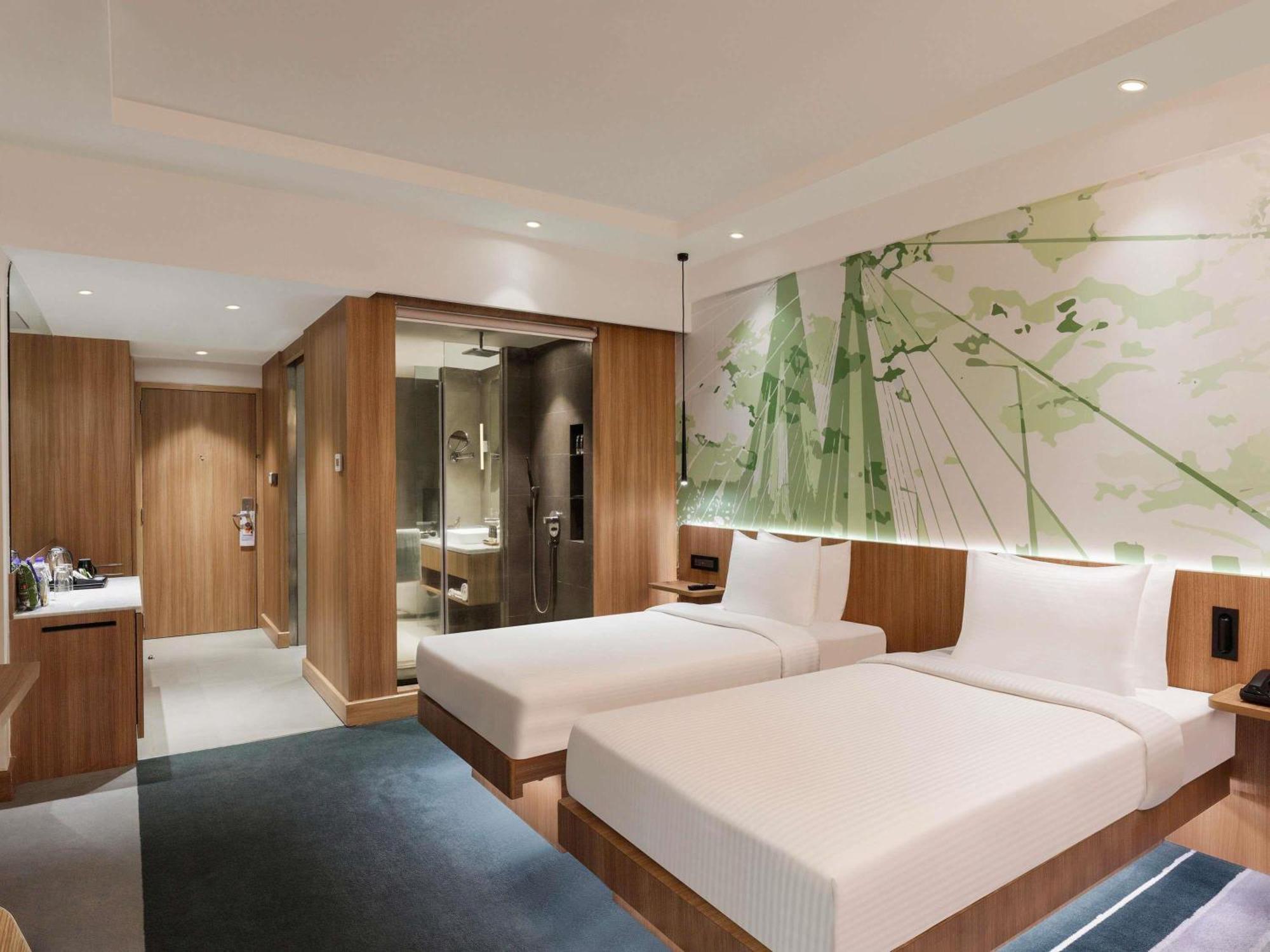 Premier Twin Bed City View Higher Floor, Buffet Breakfast, Complimentary Airport transfers (T1&T2),Premier Lounge with Cocktail Hrs. from 18:00 Hrs. to 20:00 Hrs