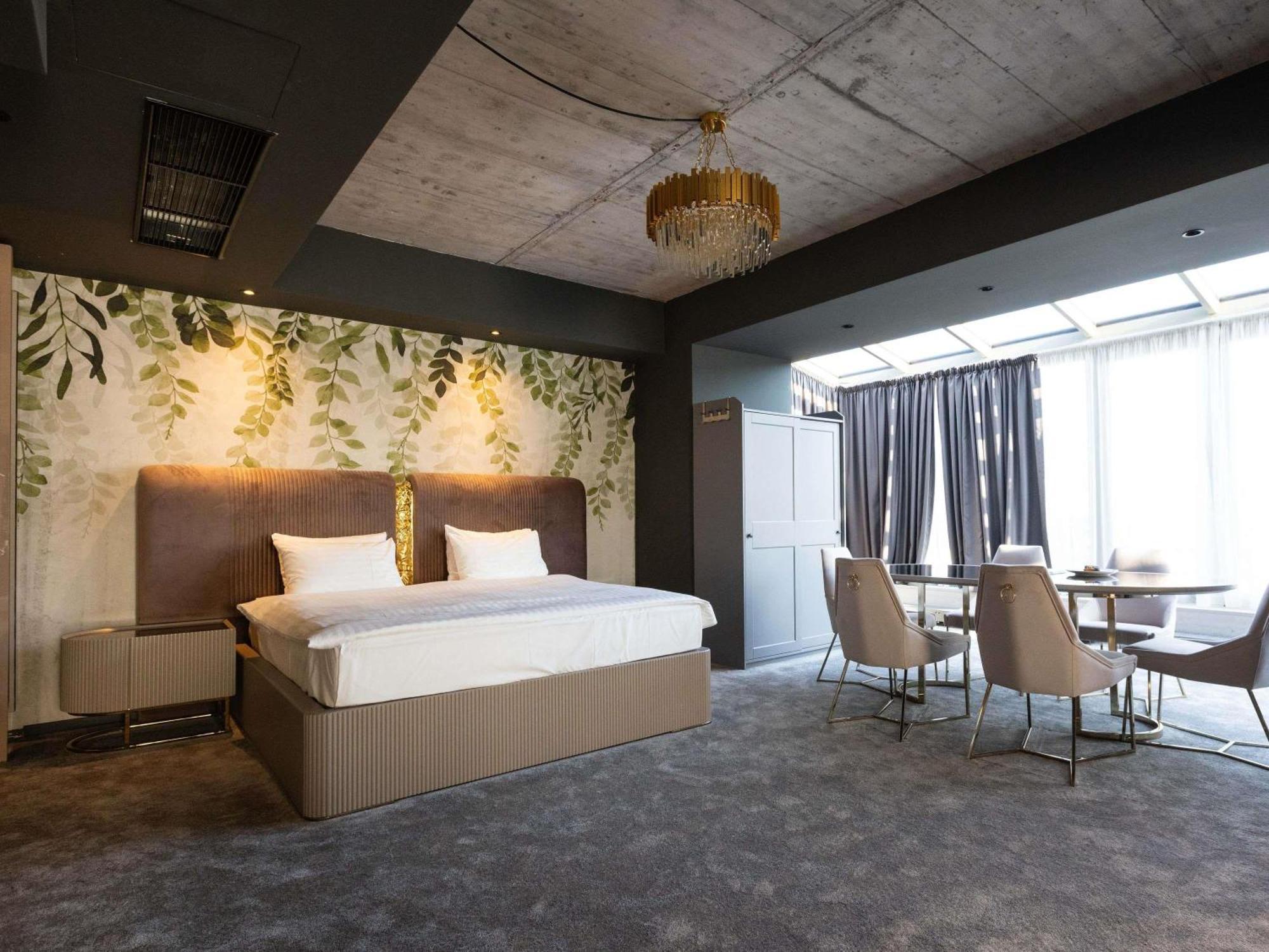 Suite Executive con 1 cama grande y 1 sofá cama