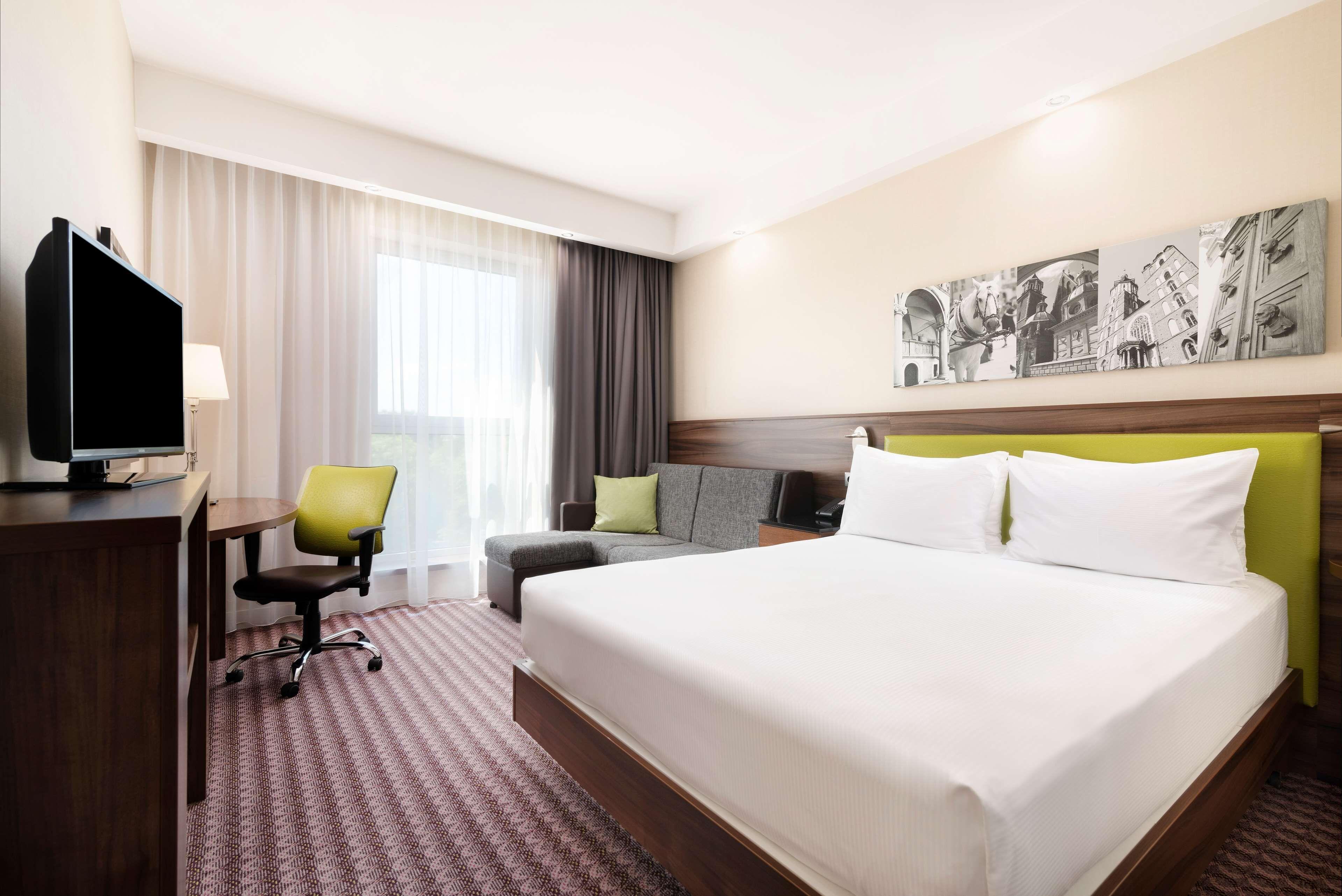 Kamer met Queensize Bed en Slaapbank
