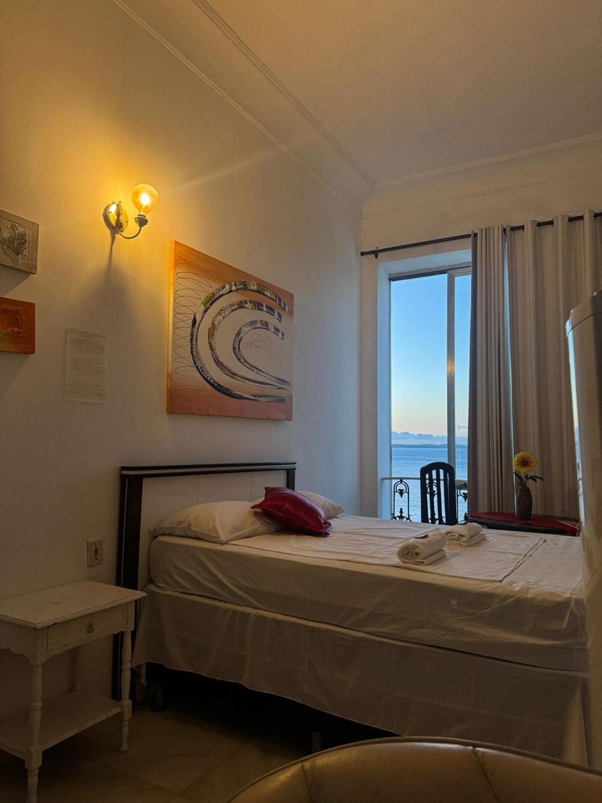Quarto Quádruplo com Vista do Mar.