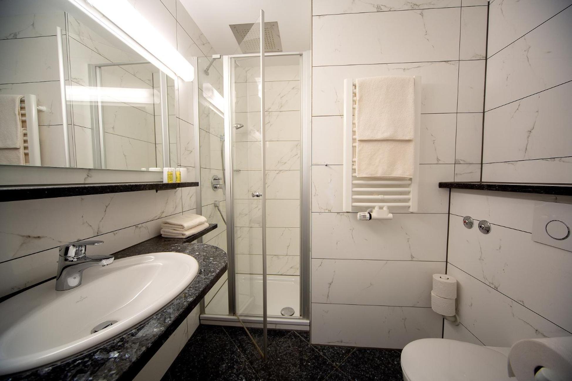 Vierpersoonskamer met Douche