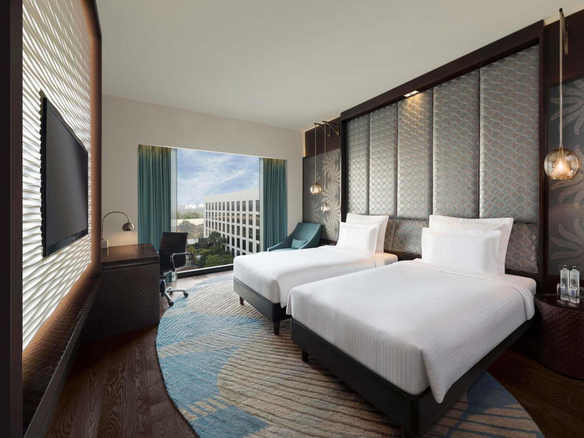 Executive Twin Room Pool Side on food beverages spa laundry | Complimentary one way airport transfer | Lounge access cocktail hours