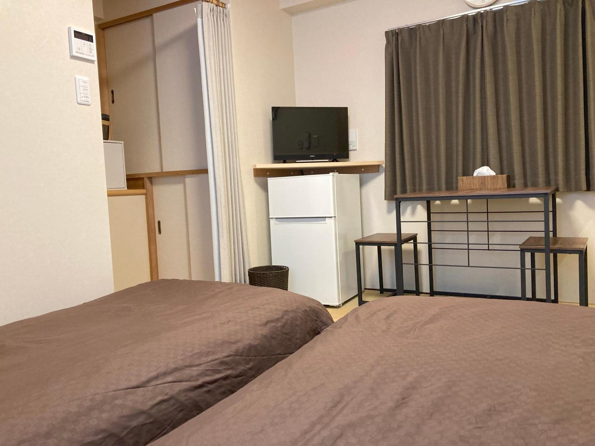 Deluxe Tweepersoonskamer met 2 Aparte Bedden