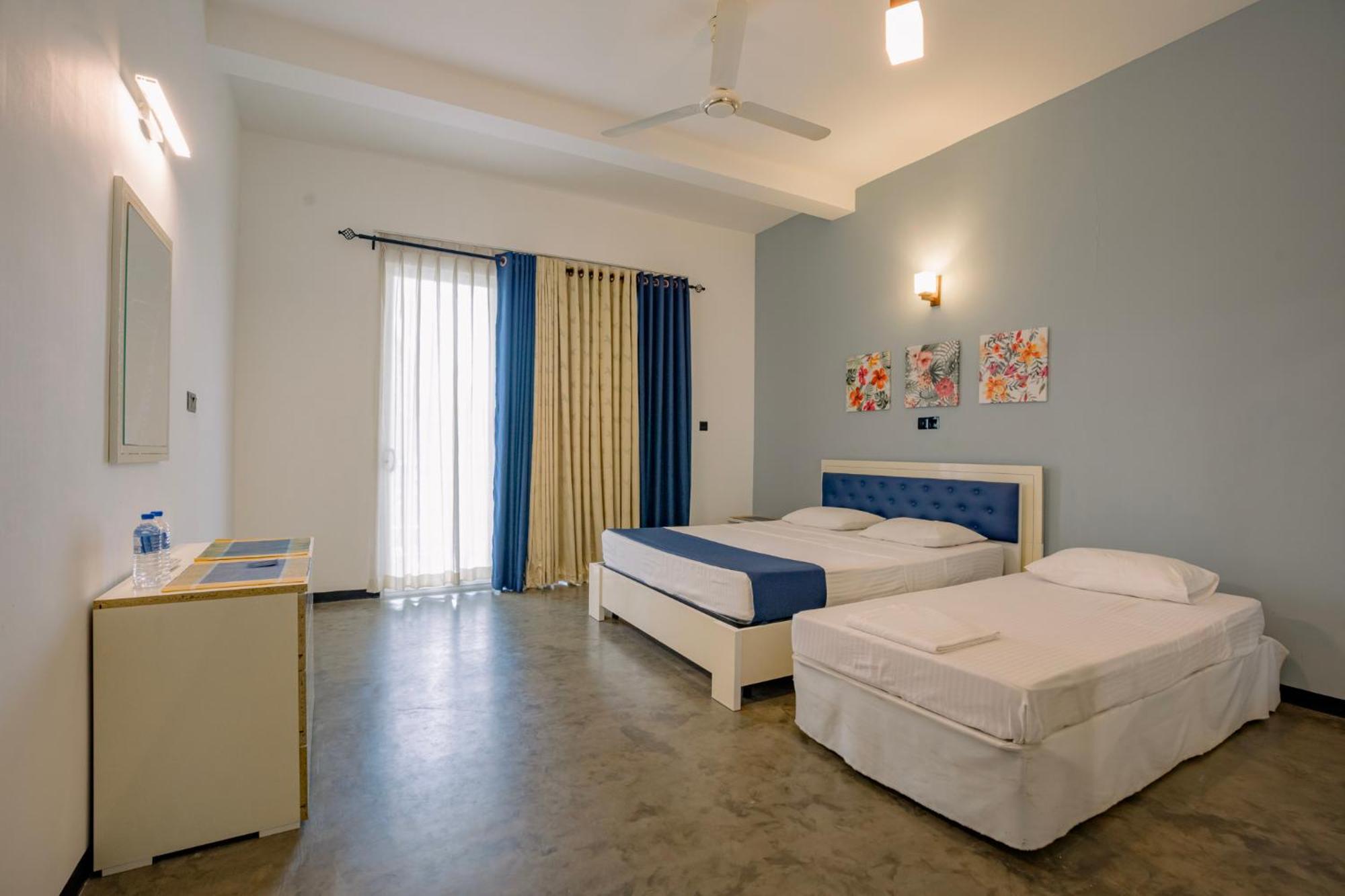 Deluxe Triple Room