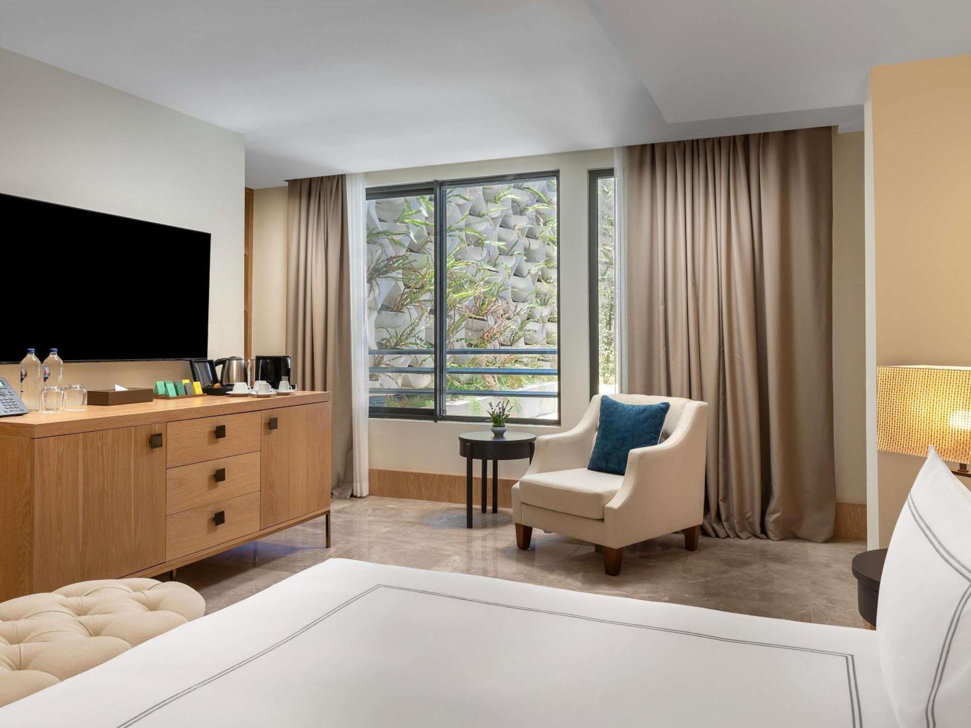 Deluxe Room Courtyard View,1766820881:JPEG
