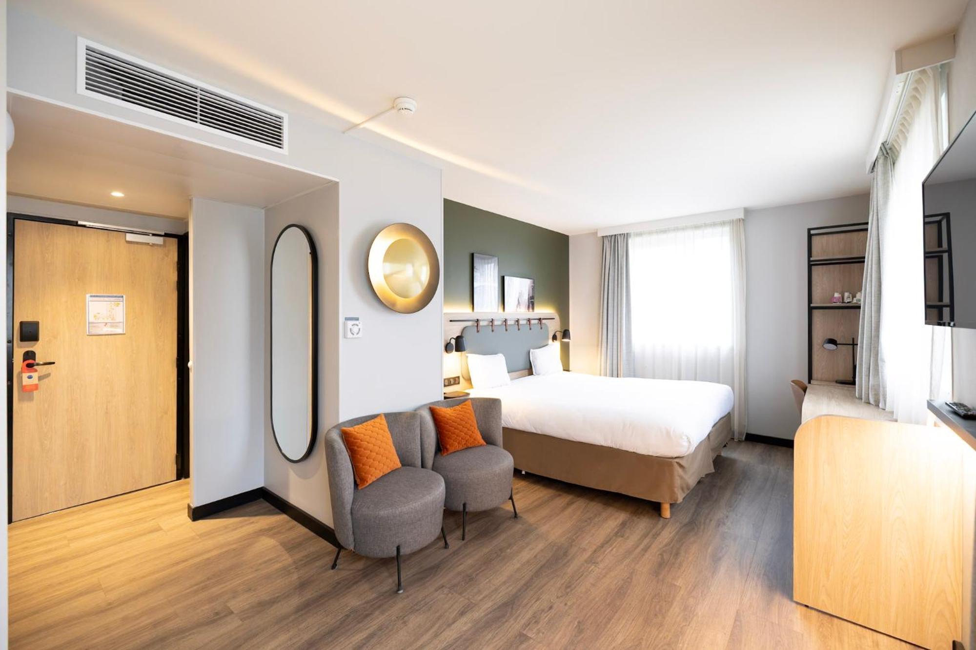 Quadruple Room One Double Bed Two Single Beds or Sofa Bed