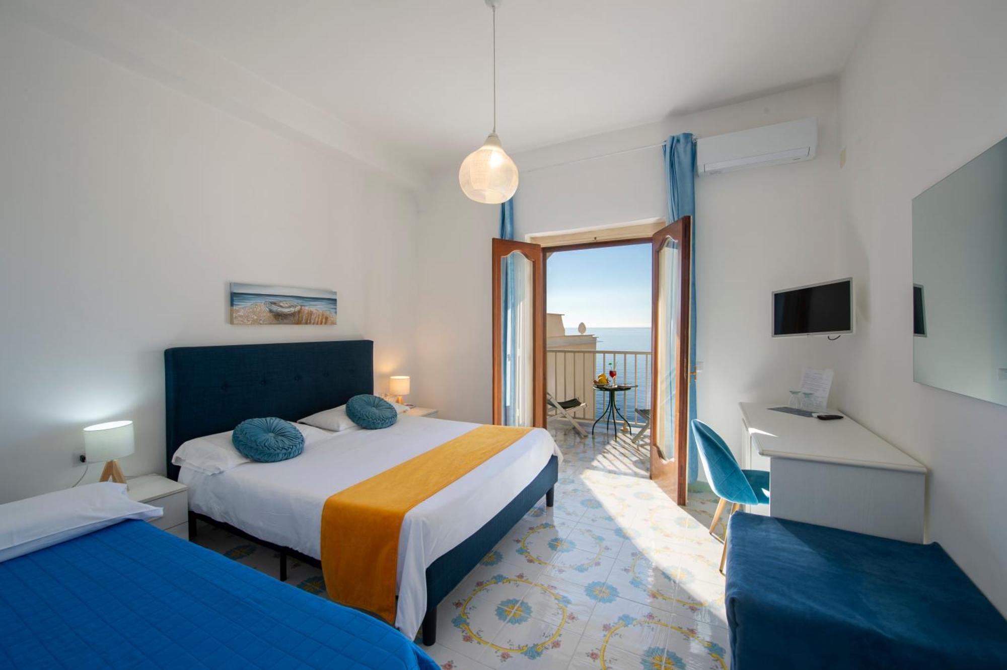 Chambre Triple Supérieure - Vue sur Mer
