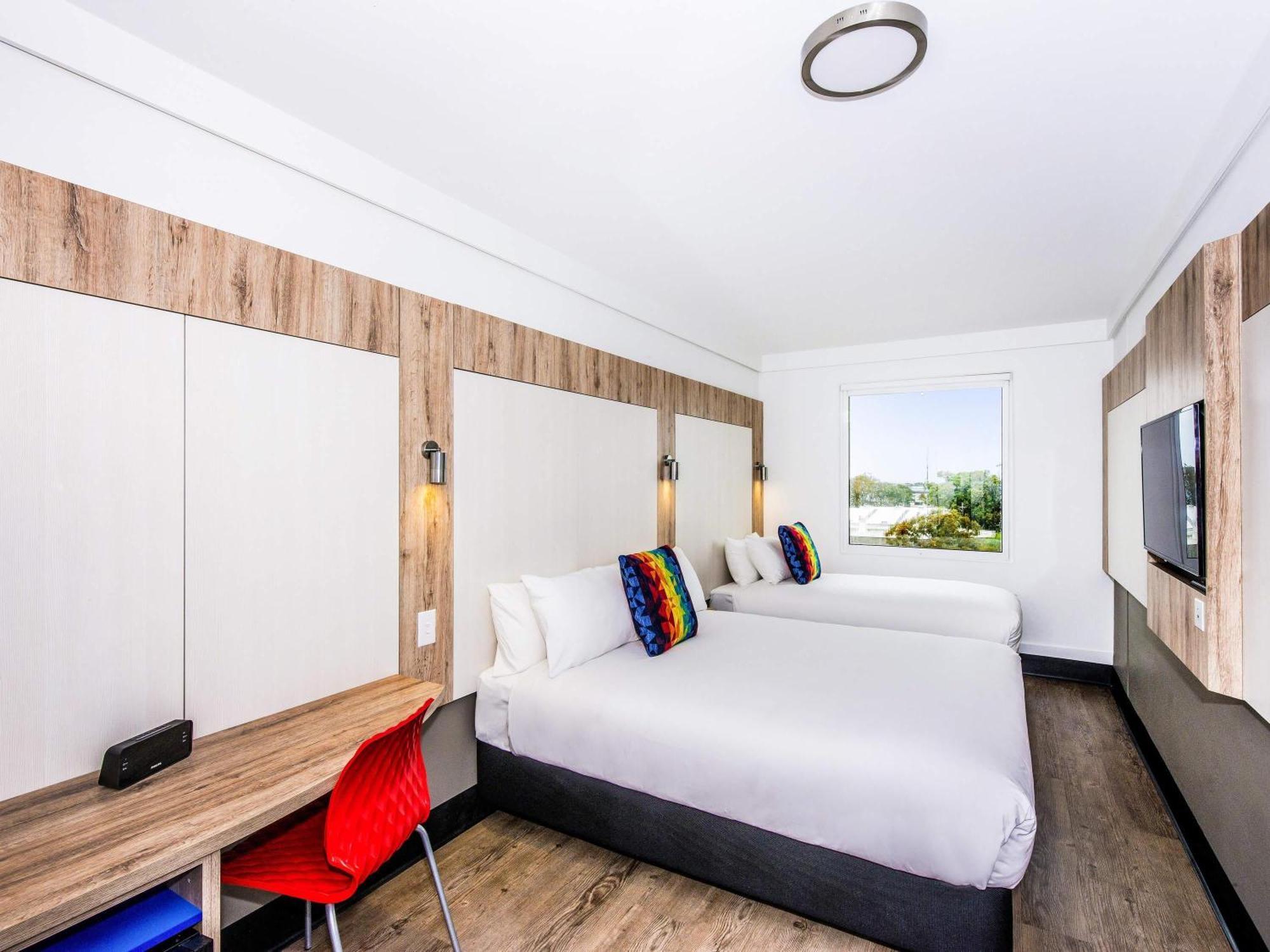 Classic Triple Room One Queen One Single Bed