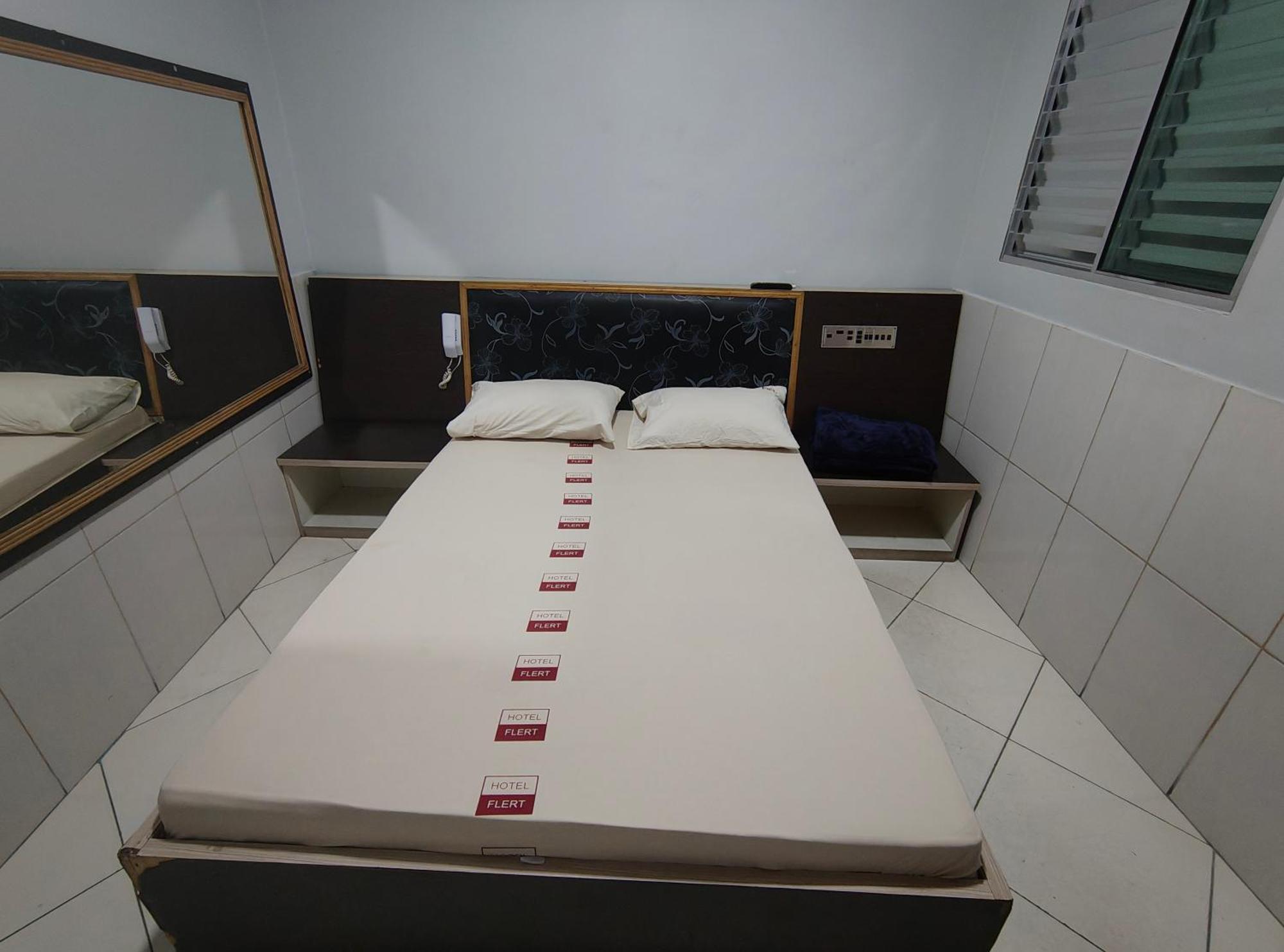Quarto Duplo