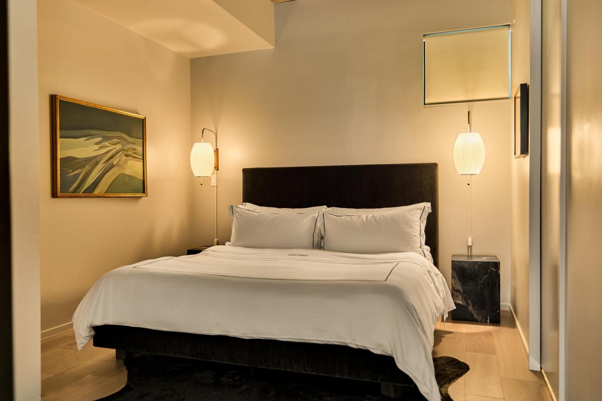 Suite con vistas al jardín y cama extragrande