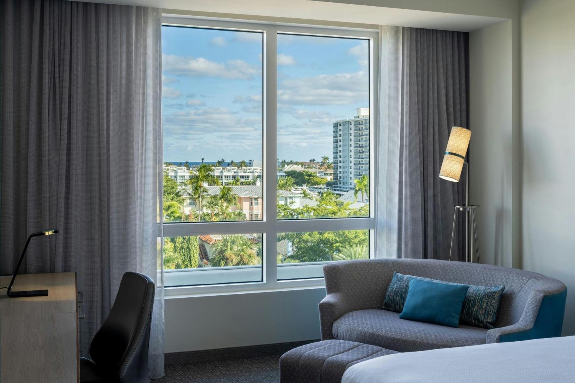 Queen Room with Two Queen Beds and Coastal View