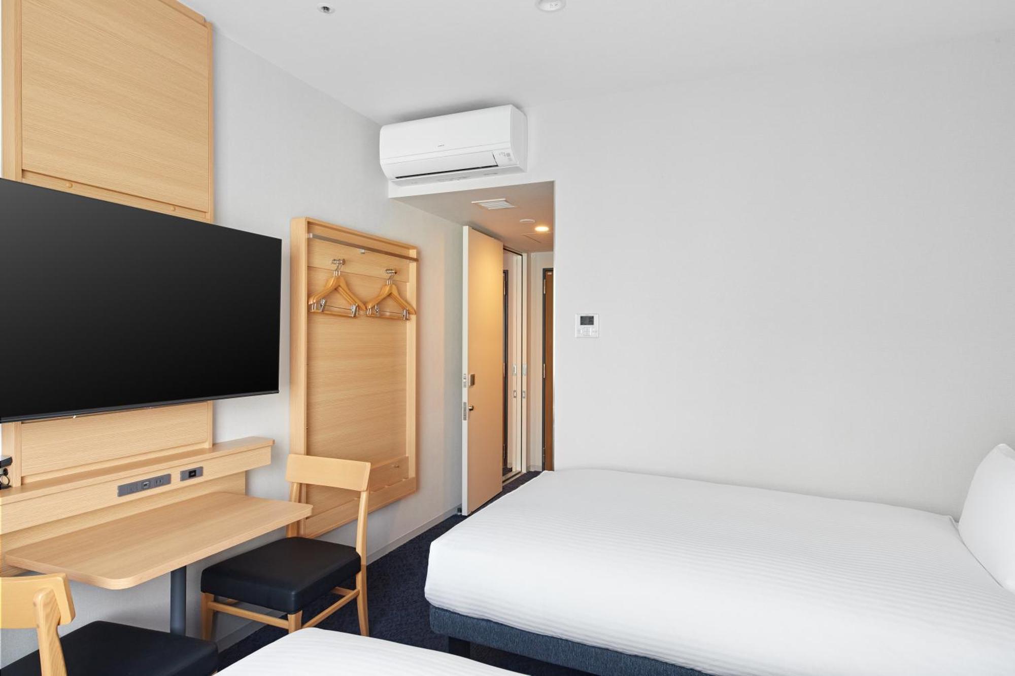 Two Connecting Rooms (1 Double Bed and 2 Single Beds) - Non-Smoking