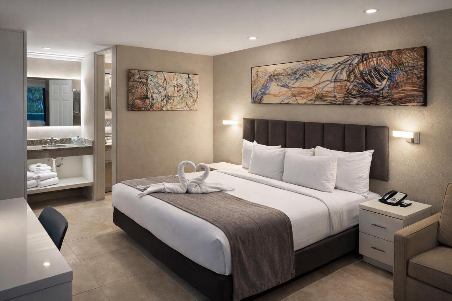 Quarto com Cama King-size e Vista da Piscina