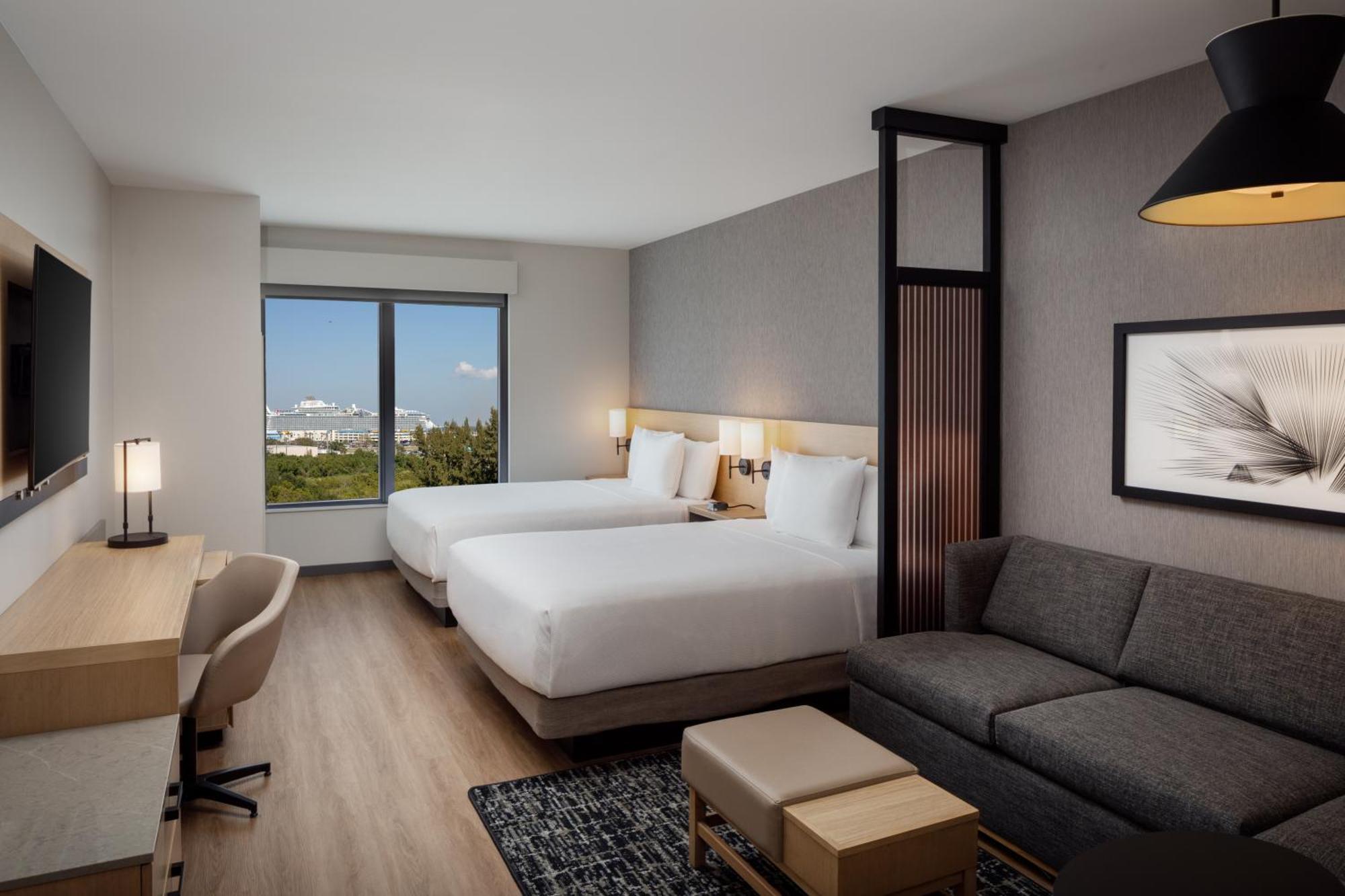 Queen Room with Two Queen Beds and Sofa Bed - High Floor
