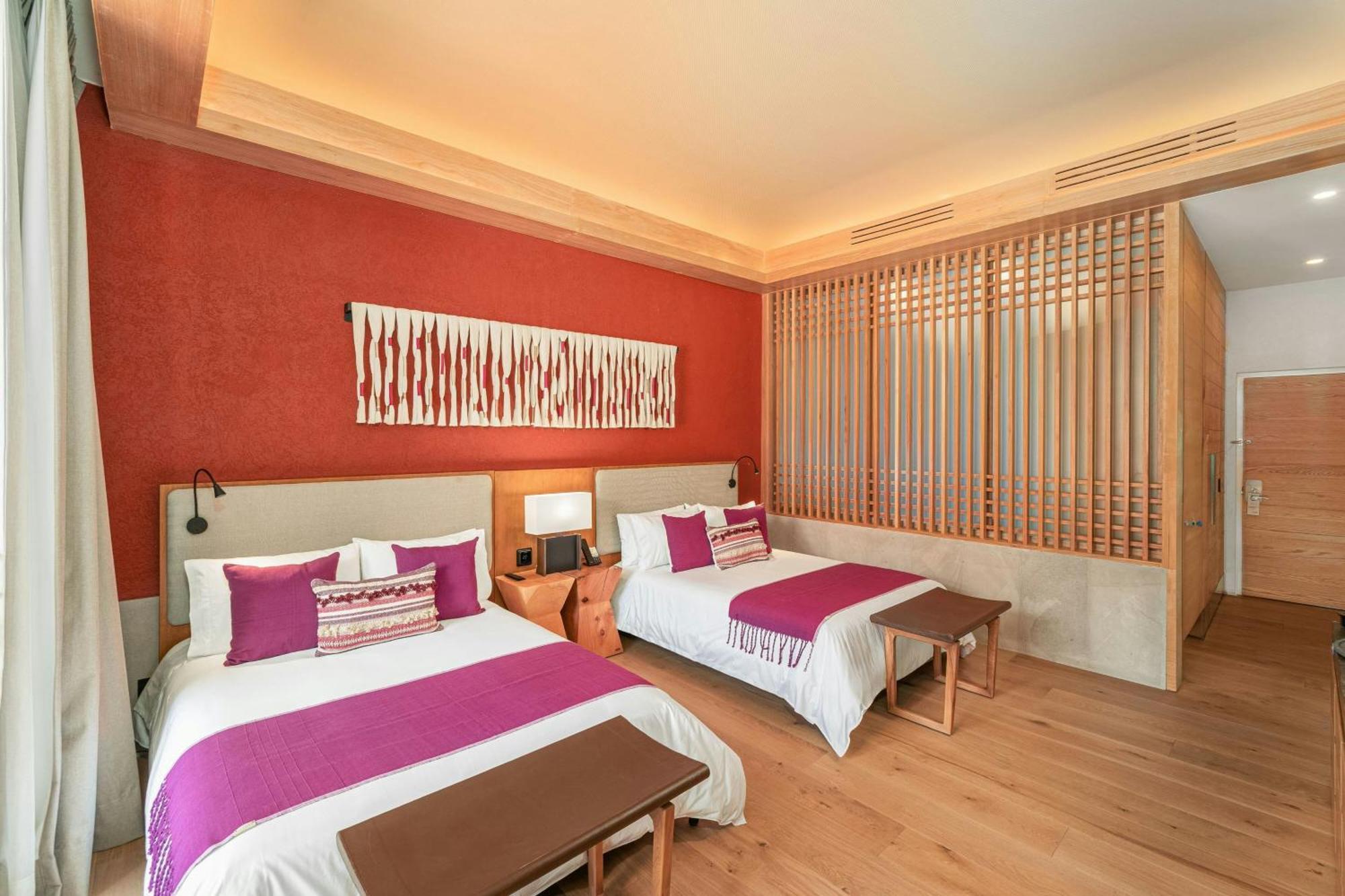 Deluxe Queen Room with Two Queen Beds - Pool View