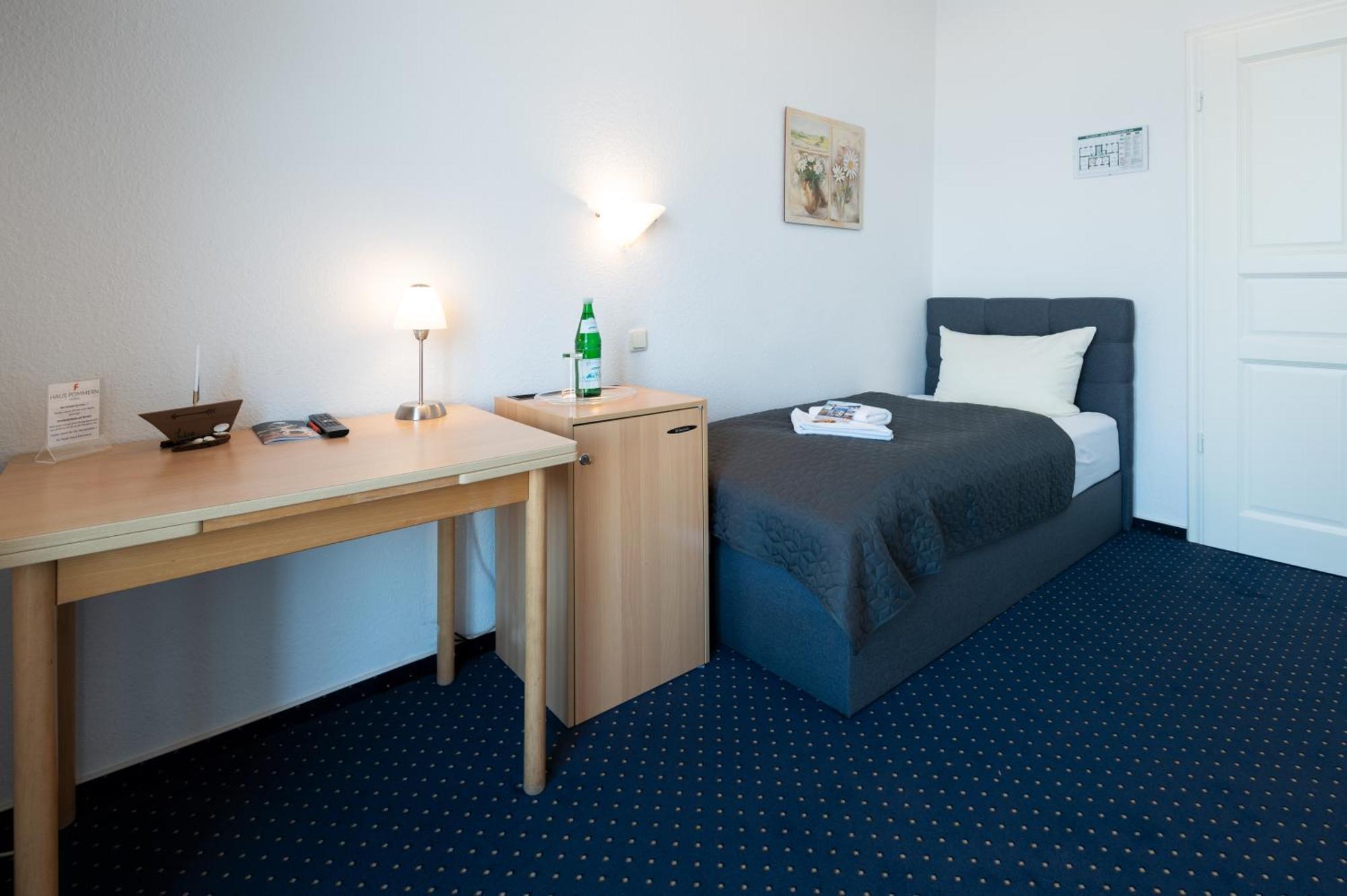 Einzelzimmer mit Balkon