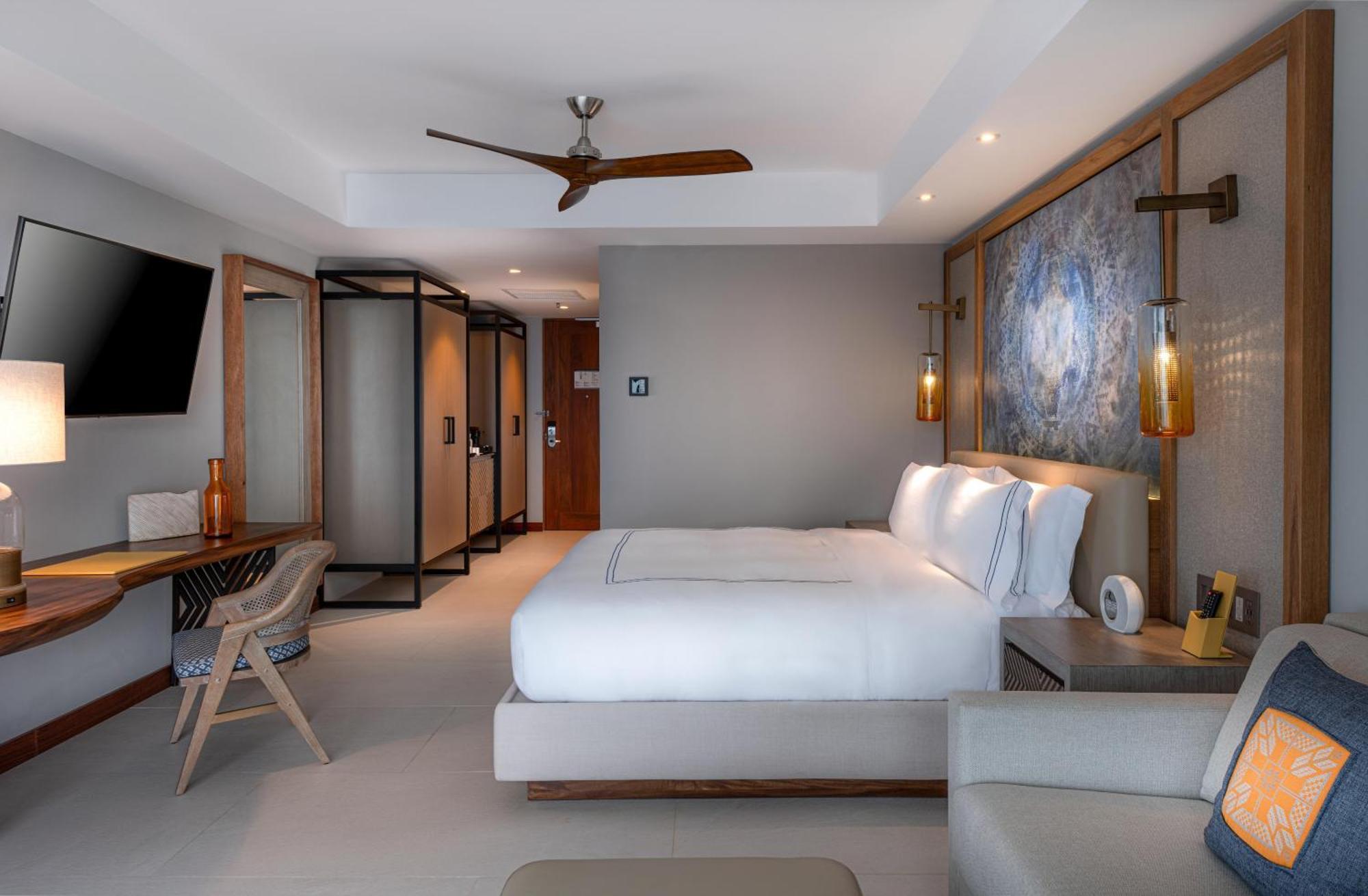 Habitación Doble con cama grande frente a la playa