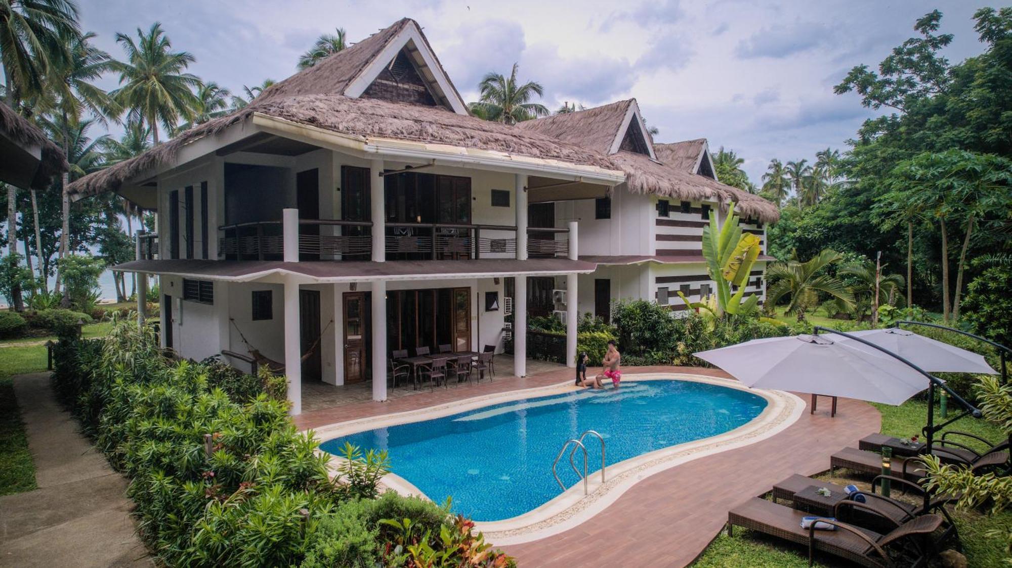Beach Front - Grand Three-Bedroom Suite