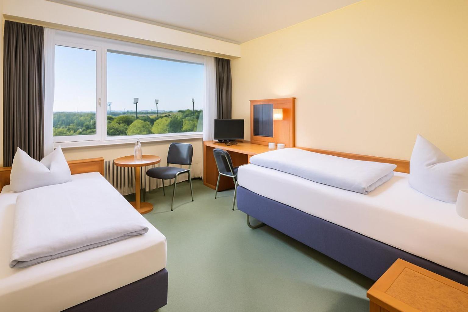 Kleine Tweepersoonskamer met 2 Aparte Bedden