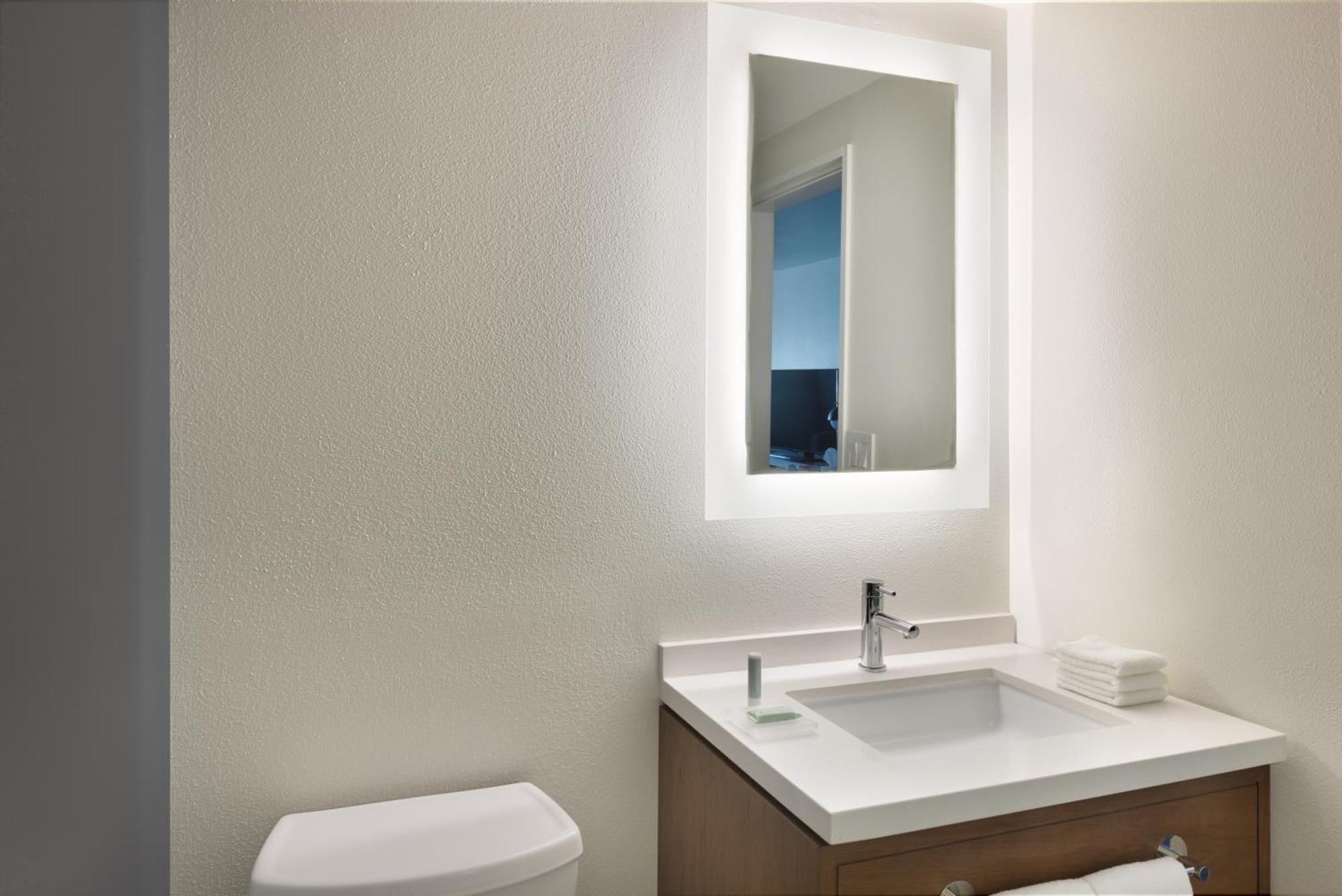 King Junior Suite with Sofa Bed and Roll-In Shower - Mobility and Hearing Accessible