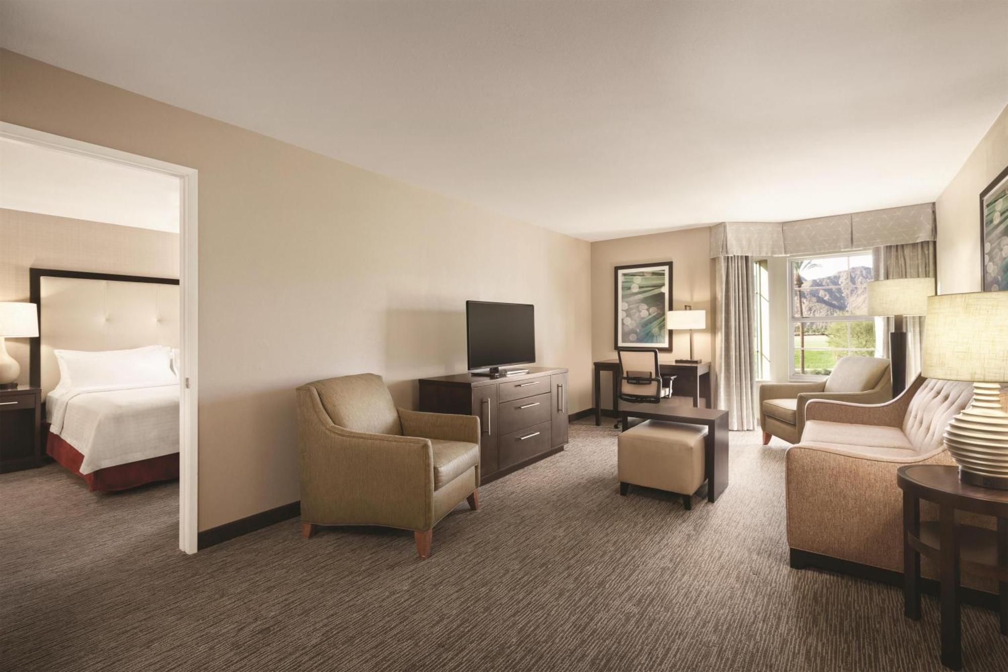 Two Bedroom Suite with One King and Two Queen Beds - Non-Smoking