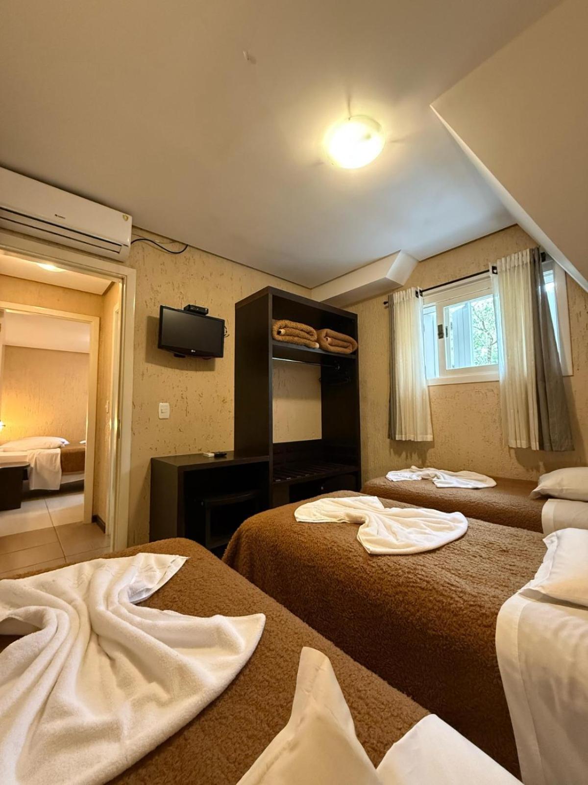 Quarto Triplo Luxo