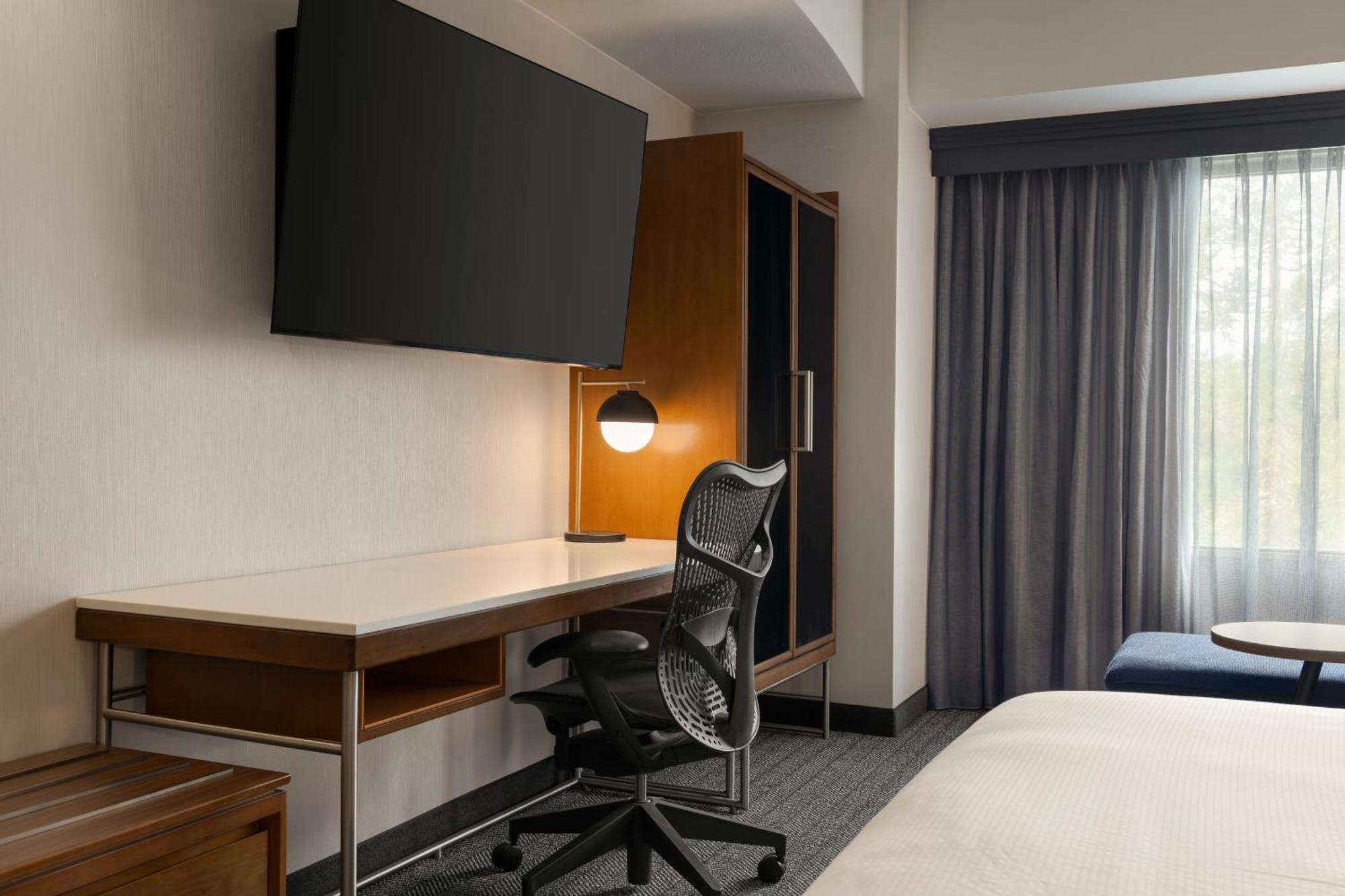 King Room with Sofa Bed, Limited View and Roll-in Shower - Mobility and Hearing Accessible