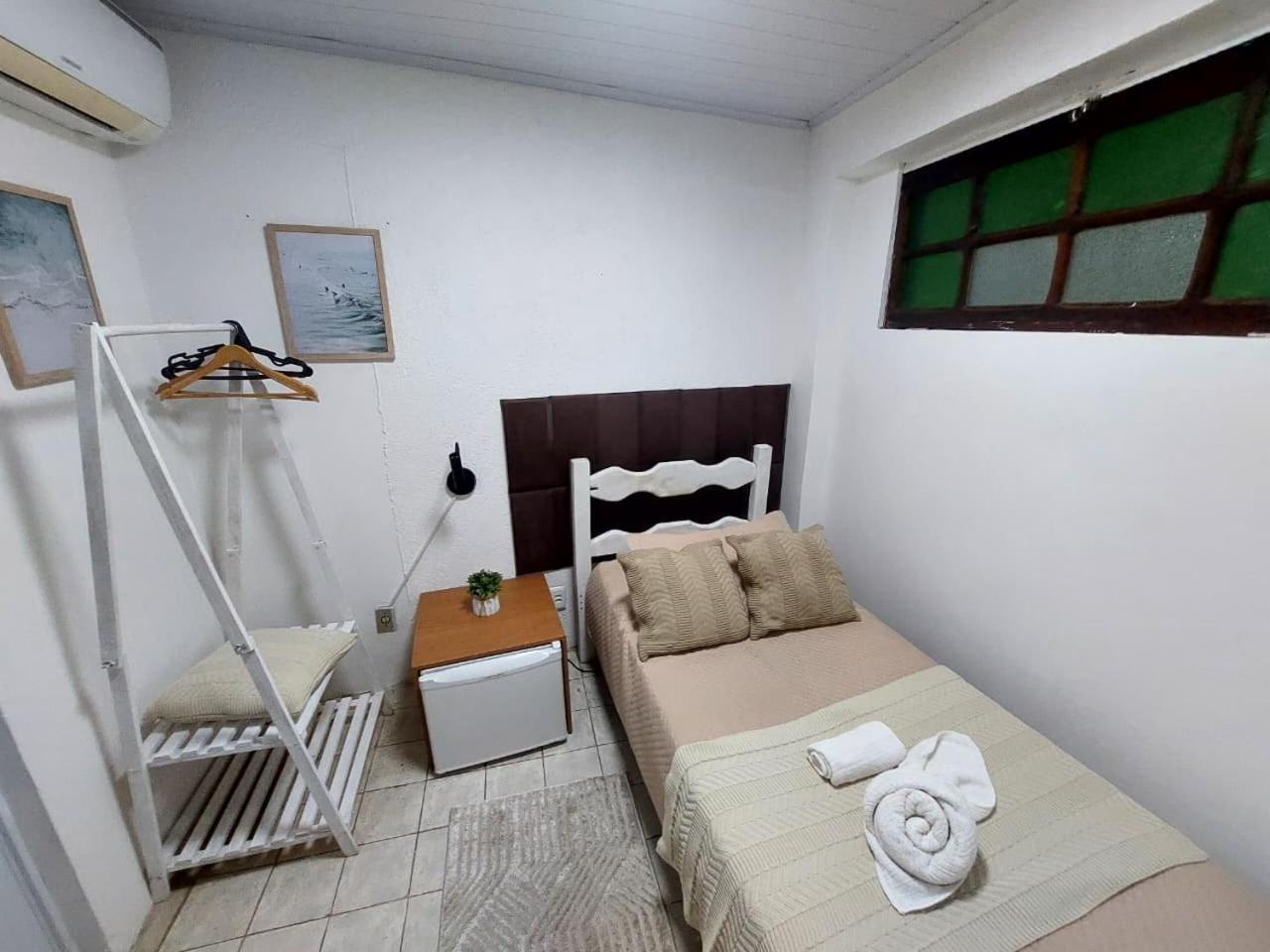 Quarto Individual Econômico