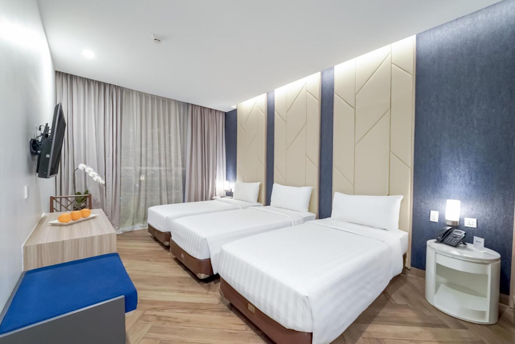 Deluxe Dreibettzimmer