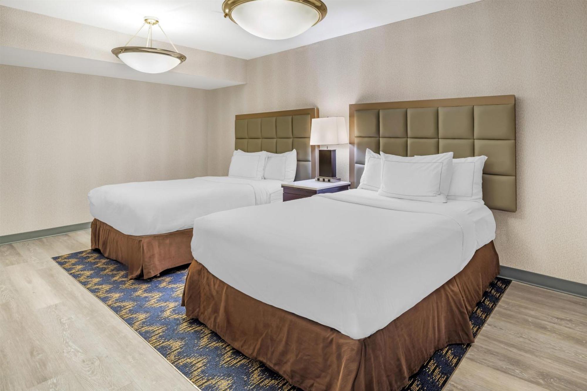 Suite with One King Bed and Two Double Beds - Non-Smoking