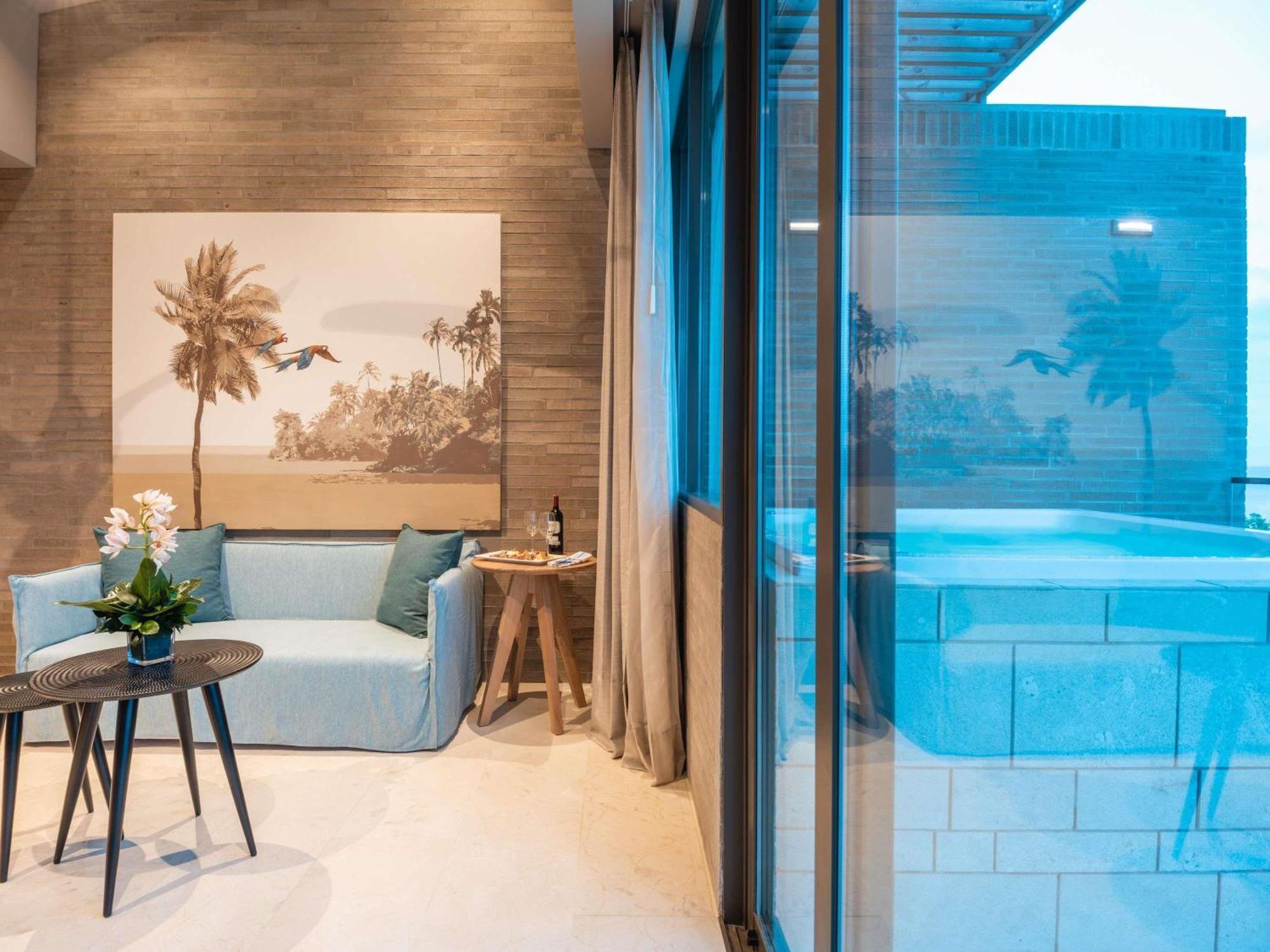 Penthouse Familial Caribéen de 2 Chambres avec 1 Lit King-Size, 2 Lits Jumeaux et Vue sur Océan