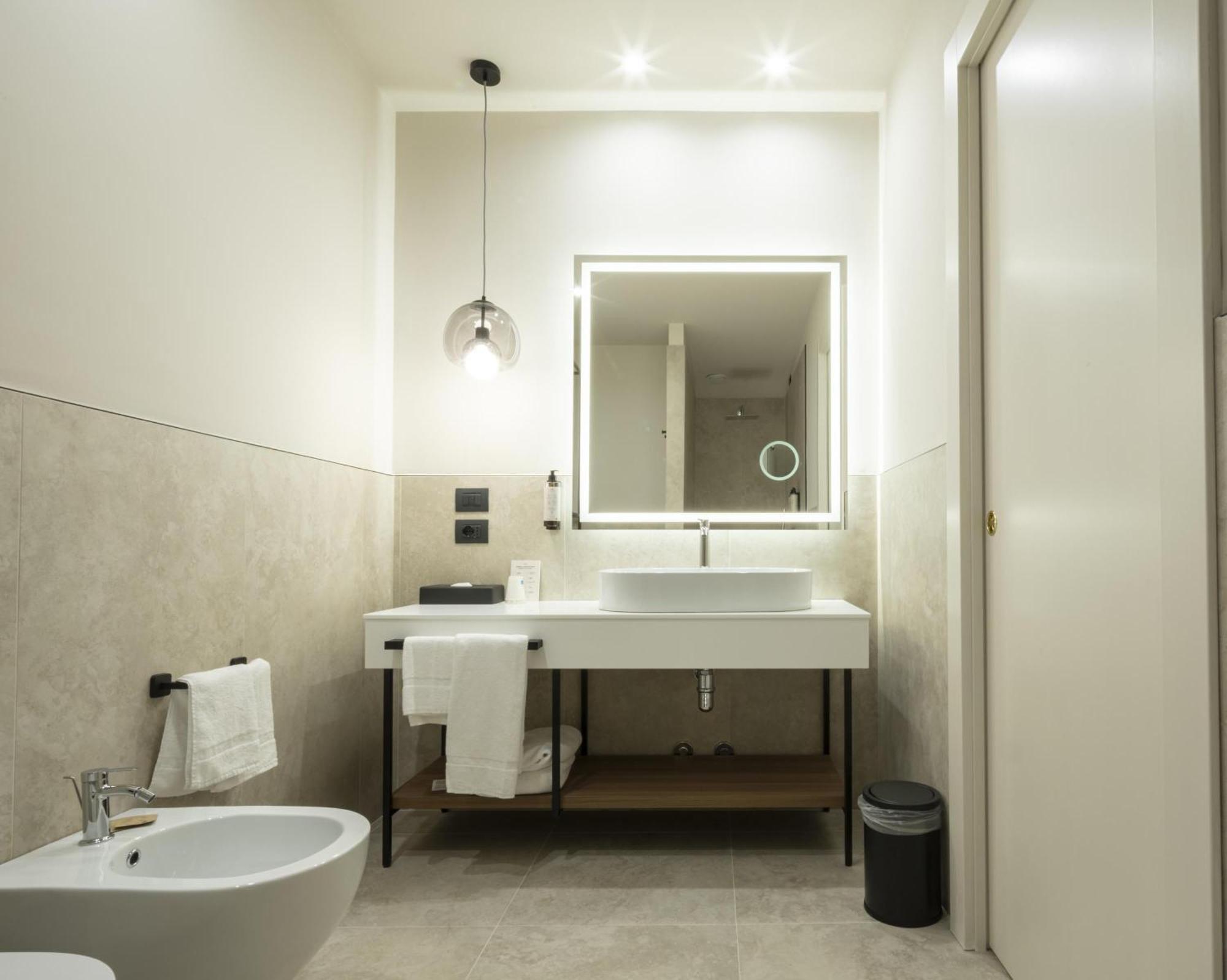 Superior Room with One Queen Bed, One Single Bed and Balcony with Lake View - Free Spa Access